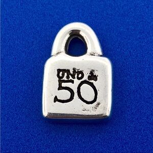 Pandora Uno De 50 Silver Tone Sun Burst Purse Lock Charm Pendant